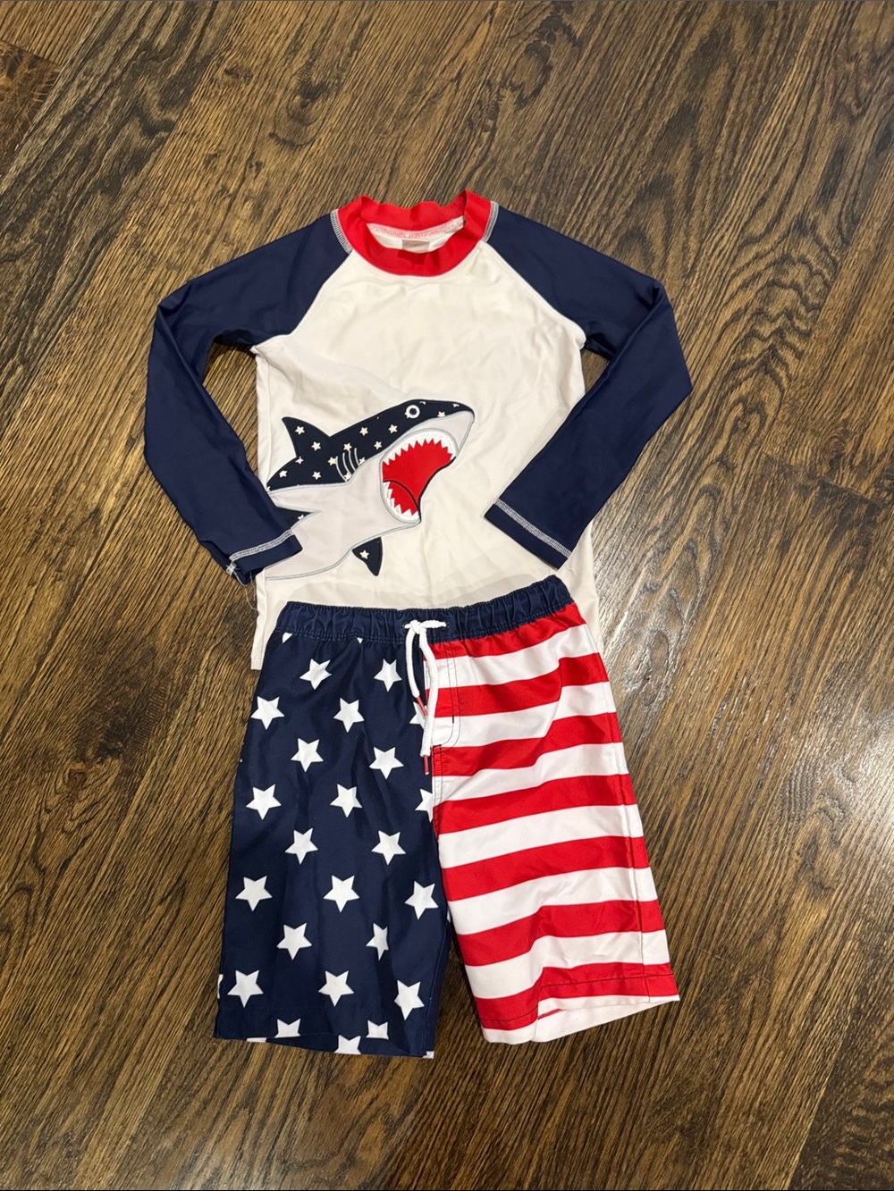 Patriotic shark swim trunks and rash guard